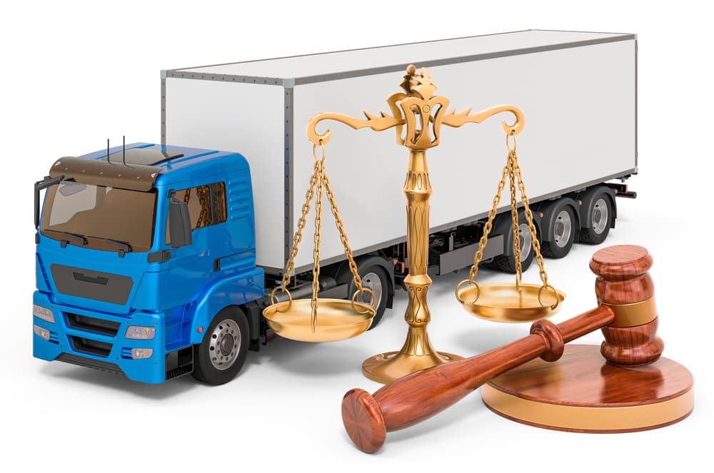 A 3D rendering of a truck alongside a wooden gavel and scales of justice, set against a white background.