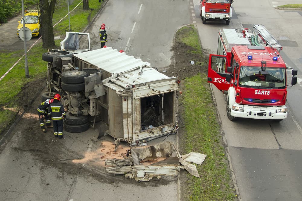 Garbage truck accident on the road.