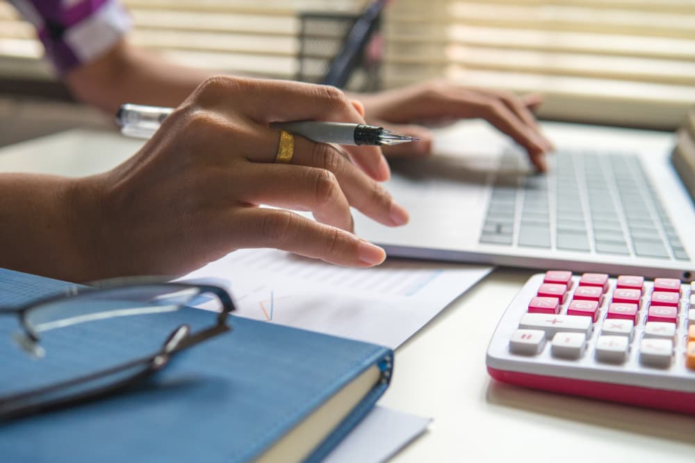 A female calculates damages.