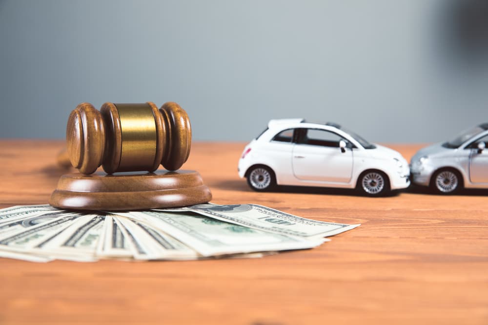 Judge's Gavel dollar in a car accident settlement