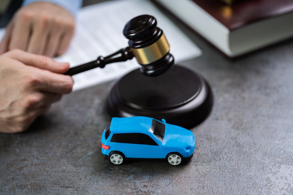 A judge's hammer with toy car