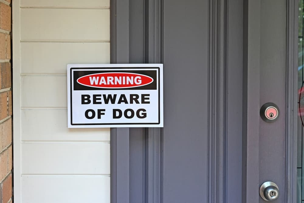 beware of dog sign on door